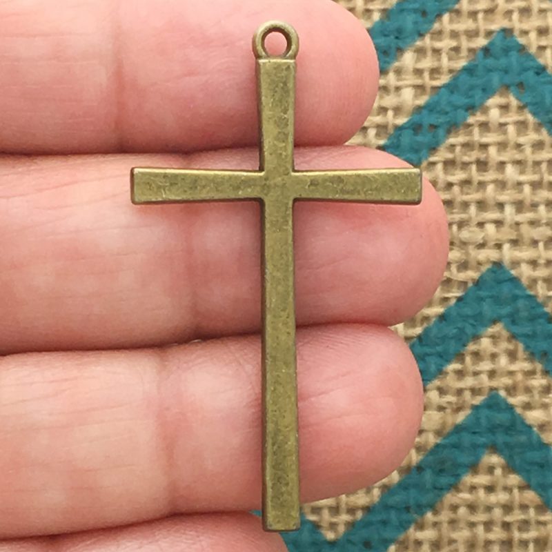 bronze cross charm