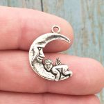 moon charm with angel