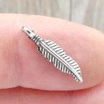 small feather charm
