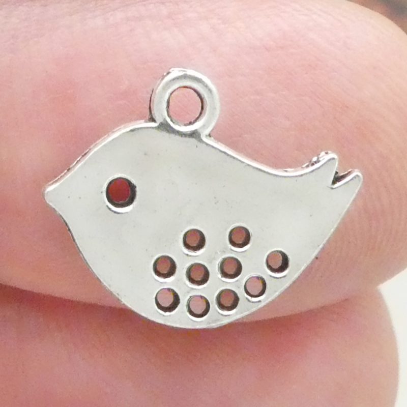 silver bird charm