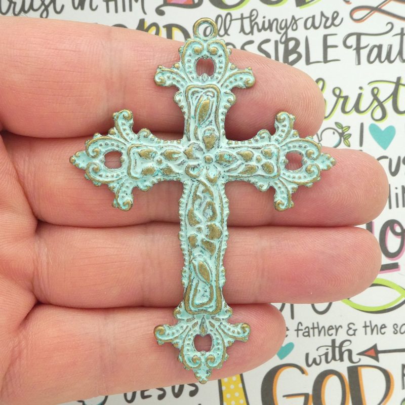 large gold cross pendant