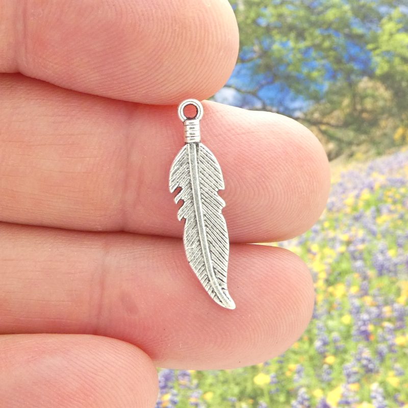 silver feather charm
