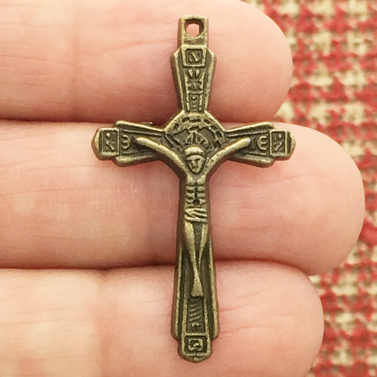 bronze crucifix charm