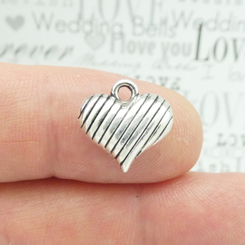 silver puffy heart charm