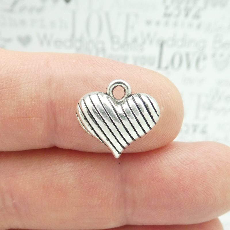 silver puffed heart charm