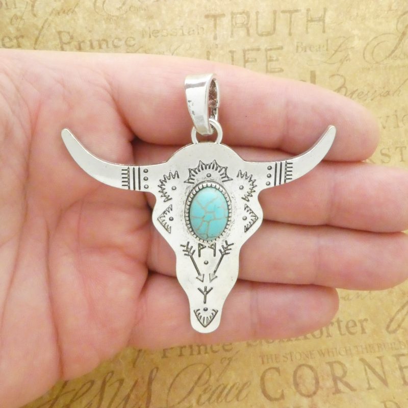silver cow skull pendant with turquoise
