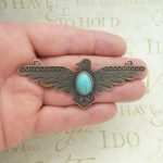 copper turquoise thunderbird pendant in pewter