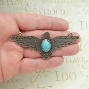 copper turquoise thunderbird pendant in pewter