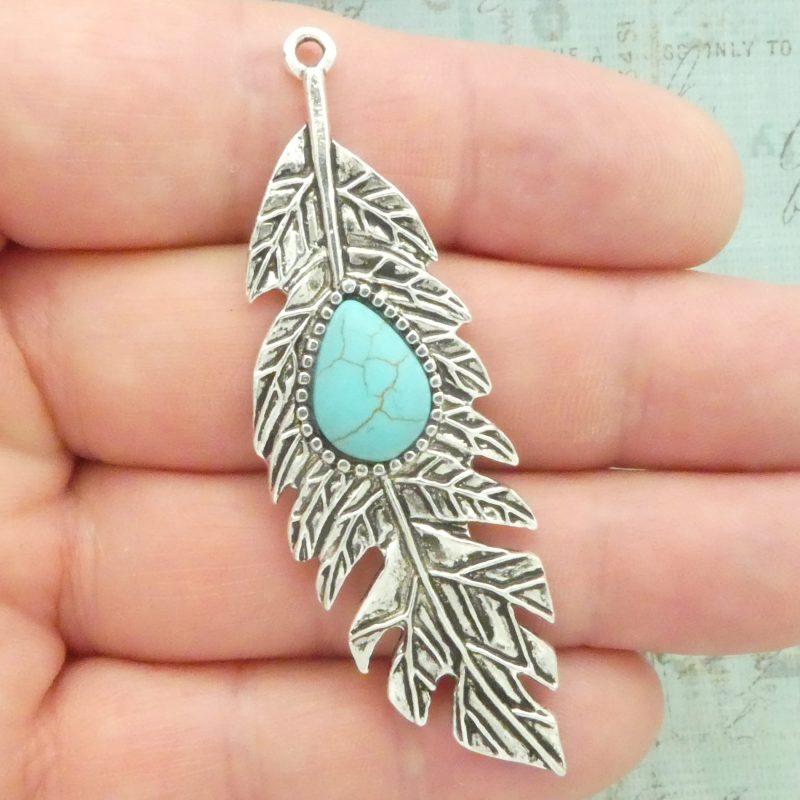 turquoise feather pendants bulk in silver pewter closeup