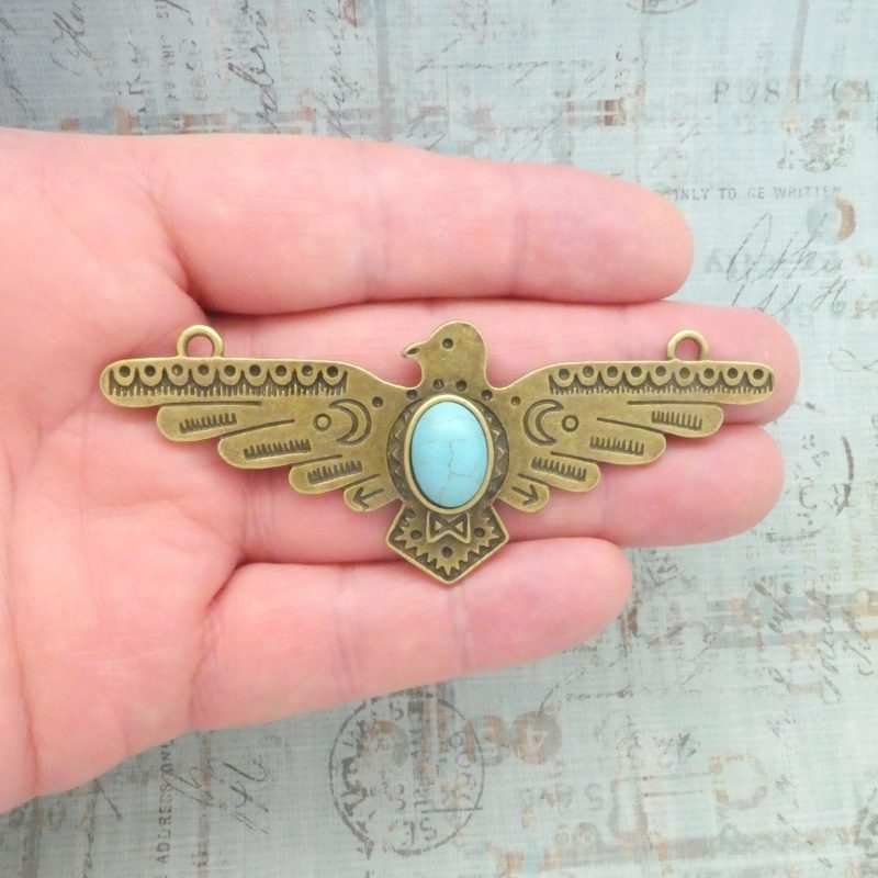 bronze turquoise thunderbird pendant in pewter