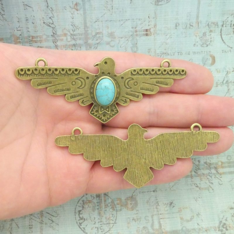 bronze turquoise thunderbird pendant in pewter front and back