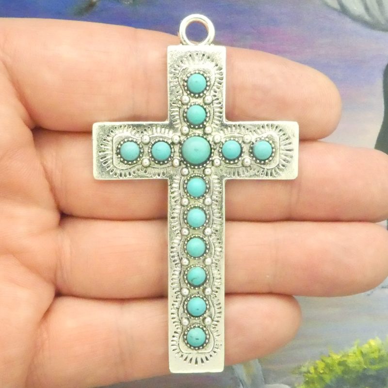 southwest turquoise cross pendants in silver closeup