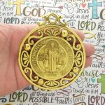 ornate St Benedict medal door ornament in gold pewter