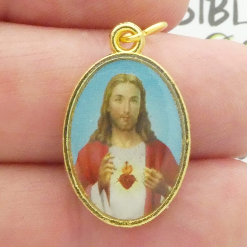Sacred Heart of Jesus Medal with Chi Rho Alpha and Omega Symbol in gold pewter closeup