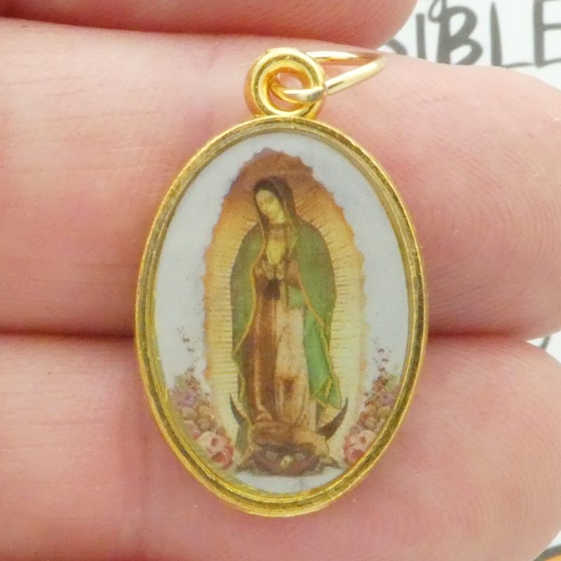 Our Lady of Guadalupe Medals with Chi Rho Alpha and Omega Symbol closeup