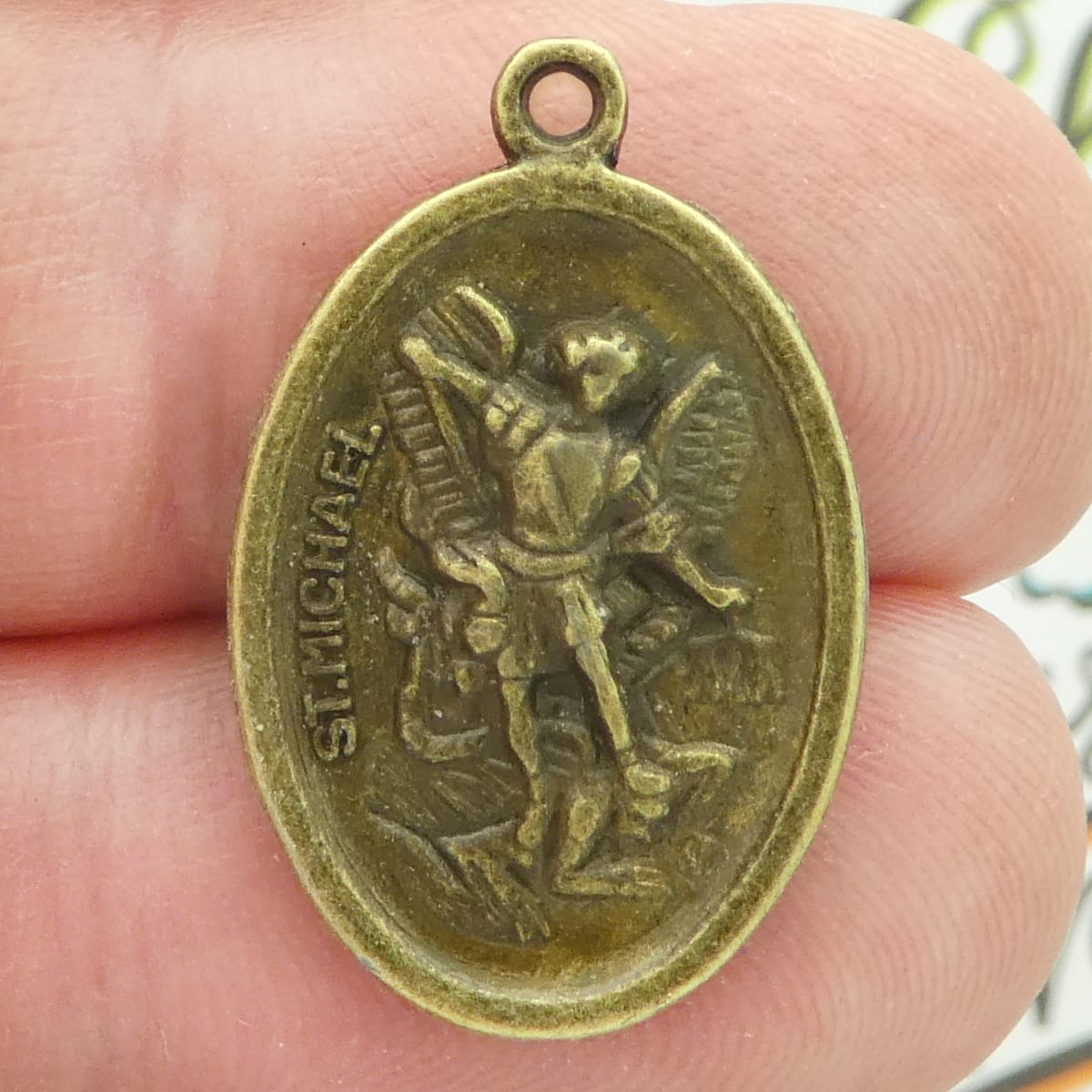 St Michael the archangel medals bulk with Guardian Angel in bronze pewter closeup