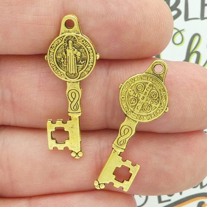 St Benedict key medals wholesale in gold pewter front and back closeup