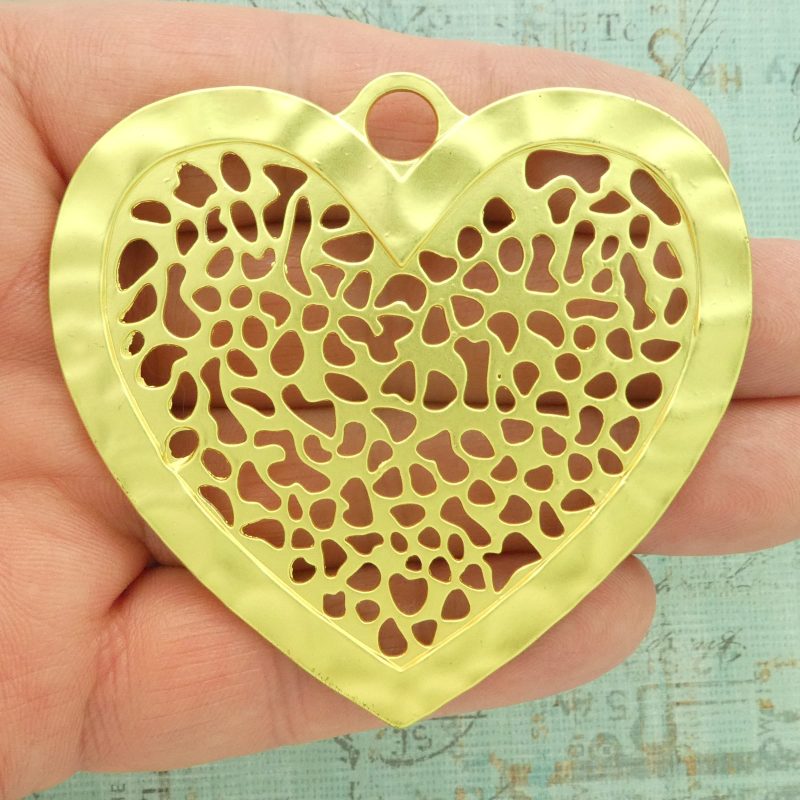 hammered heart pendants bulk in gold closeup
