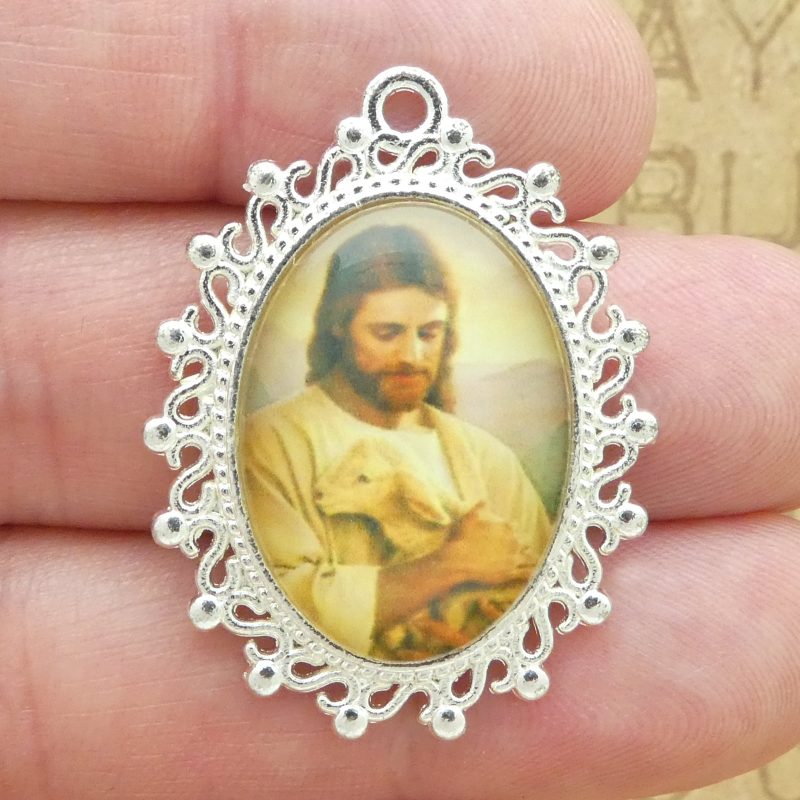 Jesus and Lamb Pendants bulk in silver closeup