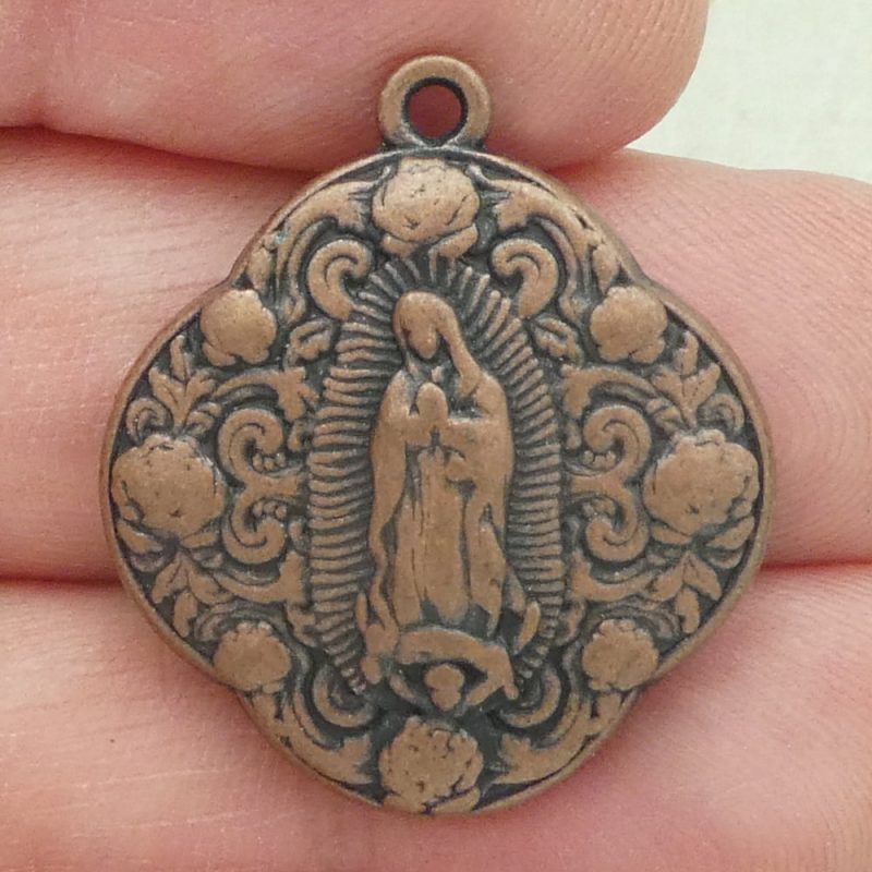 Our Lady of Guadalupe medallions bulk in copper pewter closeup