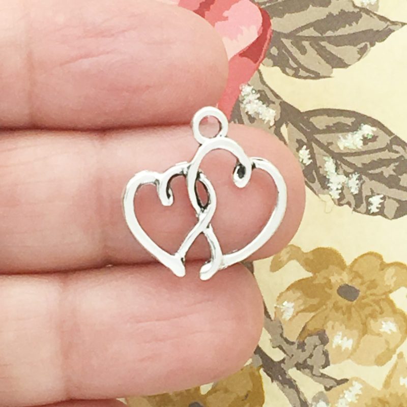 interlocking heart charm