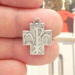 alpha and omega cross charm