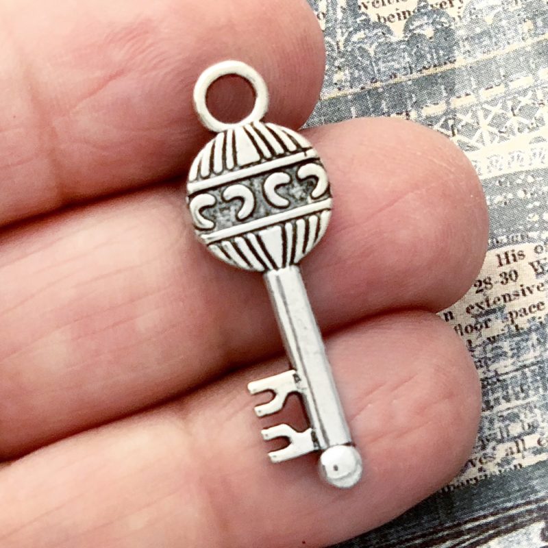 silver key charm