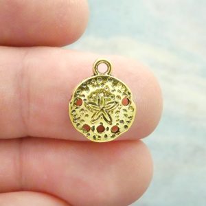 gold sand dollar charm