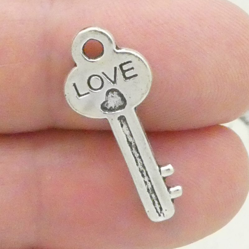 silver key charm