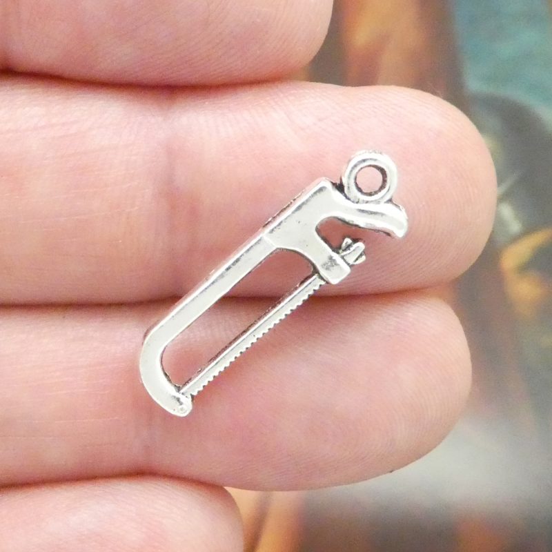 12 Silver Hack Saw Charm Tool Pendant 26x8mm by TIJC SP0495